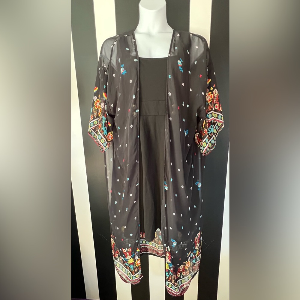 Lightweight Floral Boho Black Sheer Kimono: One Size.
Fits up to a 16/18.